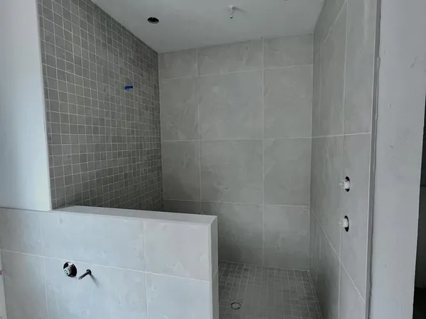 Elegant tile work and modern fixtures